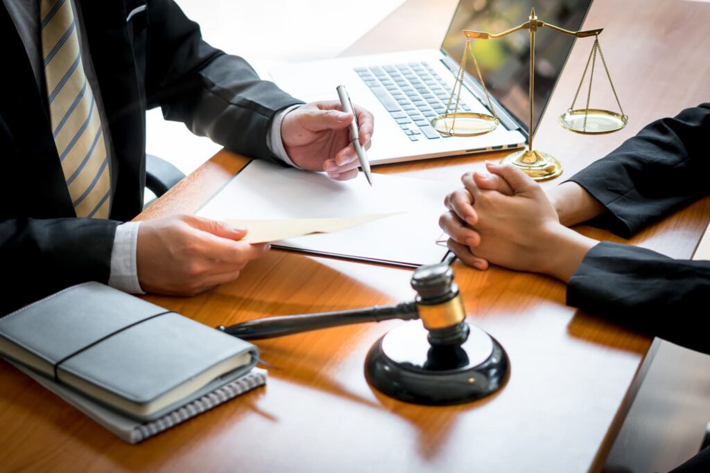 Arlington rideshare accident lawyer consulting client about injury claim and compensation