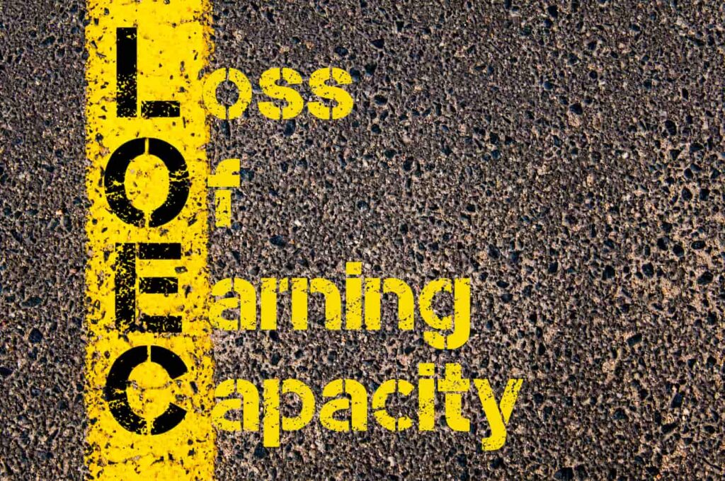 Loss of Earning Capacity After Injury Explained Loss of earning capacity concept on road surface highlighting reduced income after injury